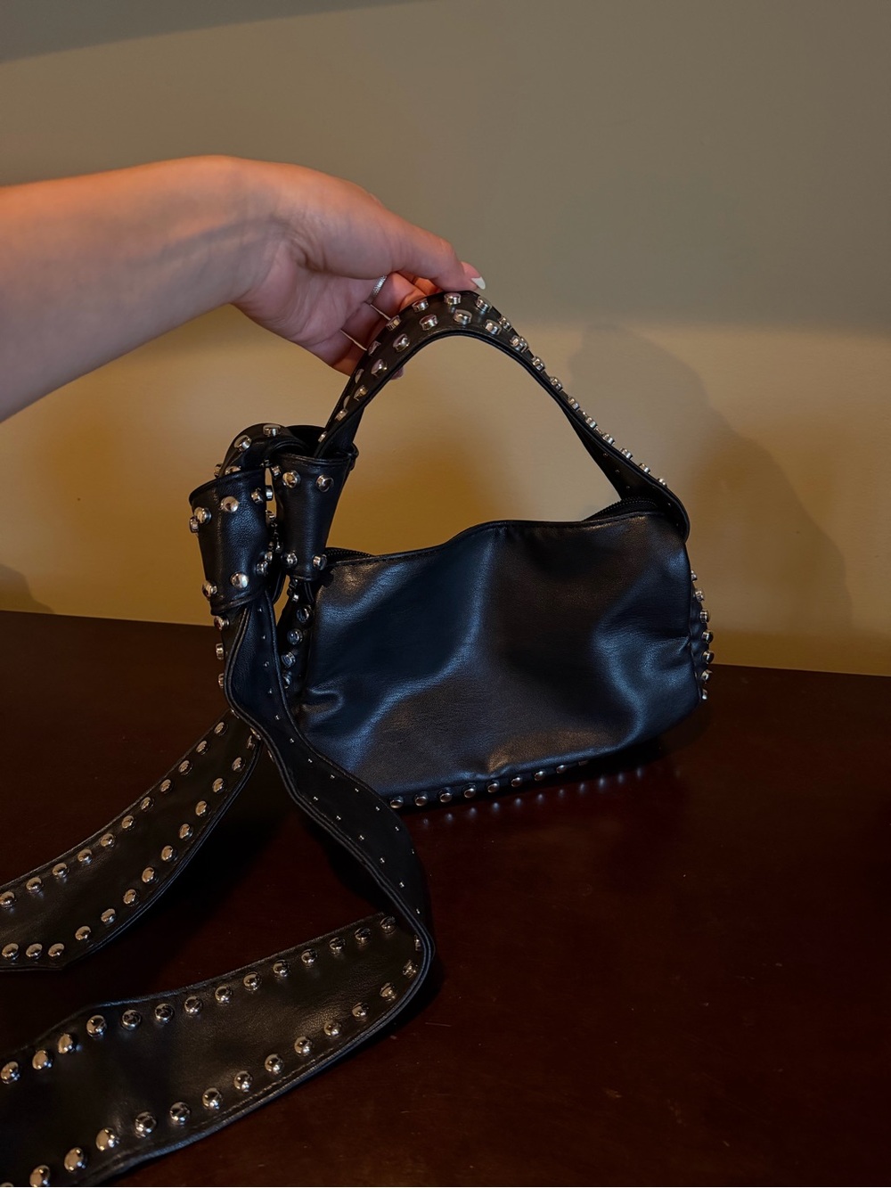 Black studded purse